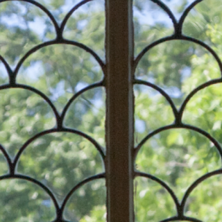 Photograph of a church window with arches